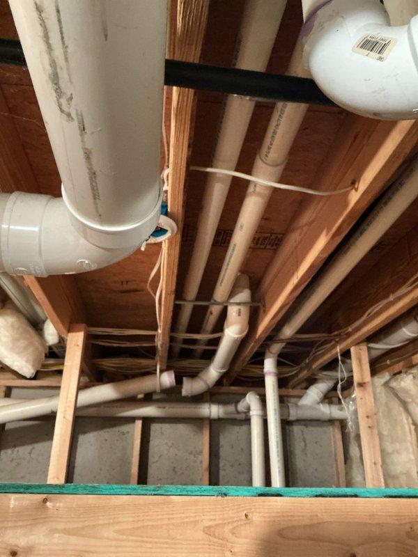 Completed full HVAC system replacement including installation of Lennox EL297UH070XV36BK high-efficiency furnace, ML13KC1-030 condensing unit positioned on exterior concrete pad, CK40CT-30/36B cased evaporator coil, T6 programmable thermostat, and 1610 media air cleaner for enhanced indoor air quality. Routed refrigerant lines and condensate drainage through floor joist structure, securing all piping with appropriate hangers and straps per manufacturer specifications. Verified all electrical connections, tested system operation across heating and cooling modes, and confirmed proper airflow and refrigerant charge levels.