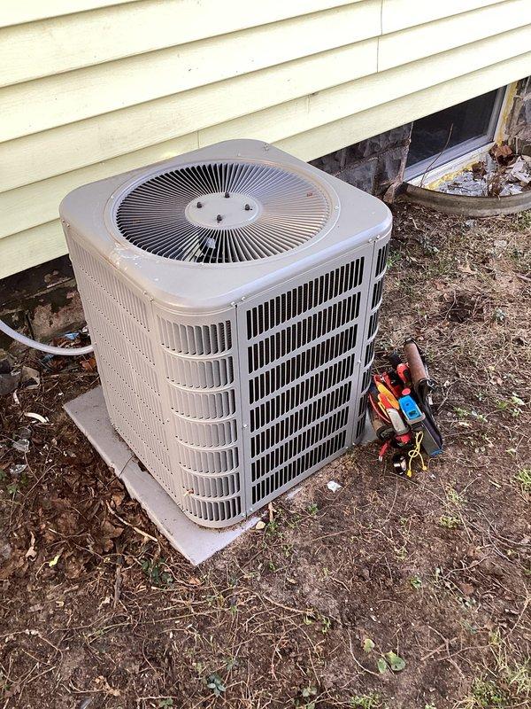 Responded to no-cooling complaint on 1-year-old Goodman 7AC13F24P-01A condenser unit. Connected manifold gauges to diagnose system pressures and verified unit operation. Unit found operating within normal parameters following diagnostic testing; customer educated on proper system operation and expectations for recently serviced equipment.