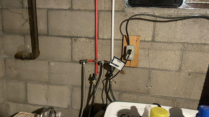 Completed comprehensive re-pipe of residential water distribution system from meter to all fixtures, including two 3-fixture bathrooms, kitchen sink, laundry connection, and two sill faucets. Installed new 40-gallon draft vent water heater with proper venting and provisioned softener loop without bypass valve. All plumbing lines installed to code using PEX and copper piping with appropriate shut-off valves and connections at each fixture location.