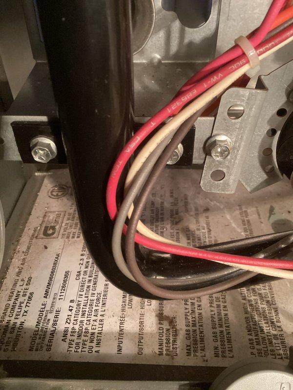Responded to no heat call on furnace unit under 10 years old. Upon inspection, found unit with accumulated corrosion debris at base and accessed internal components to diagnose heating failure. Inspected burner assembly with flame sensors, verified electrical connections at terminal block, and examined wiring harness for proper continuity. Unit restored to proper operation with heat confirmed at registers.