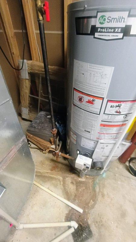Installed a 40-gallon gas power vent water heater in unit C23/19 per approved quote and purchase order 406370861-001. Replaced existing AO Smith ProLine XE unit with new equipment, connecting gas supply lines, copper water piping, and PVC venting in the mechanical room. Completed site evaluation upon arrival, performed installation with proper safety shutoffs, drain pan placement, and pressure relief valve configuration, ensuring all connections met code requirements.
