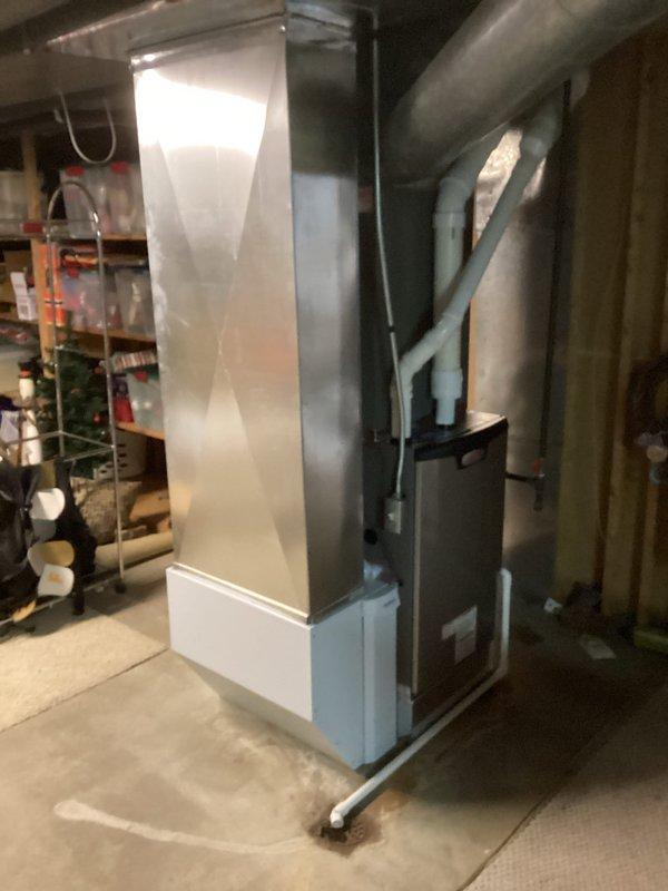 Completed full HVAC system installation including Lennox EL297UH090XV48C high-efficiency furnace, ML17KC2-048 condensing unit, CK40CT-49C cased coil, 1620 filter cabinet with filter, and T6 non-WiFi thermostat. All equipment was installed per manufacturer specifications in basement mechanical room with proper venting, drainage, and electrical connections. System tested and verified operational with proper airflow and temperature differentials across all components.