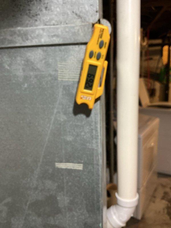 Completed installation of Lennox ML196UH045XE36BK high-efficiency furnace in basement mechanical room, including new condensate pump with tubing routed through white PVC piping system. Reconnected unit to existing return air drop and filter rack, installed new T4 thermostat for system control, and replaced air filter to ensure optimal airflow and system performance.