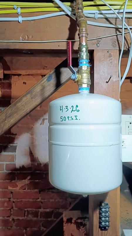 Installed new tanked water heater in basement utility area, including all necessary connections to existing copper supply lines and proper venting configuration. Connected expansion tank rated at 50 PSI to system and verified all pressure relief valves were functioning correctly. Inspected toilet reported as running constantly and performed necessary repairs to resolve continuous water flow issue.