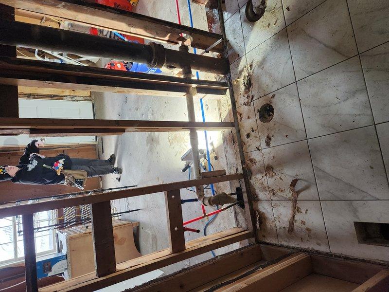 Removed leaking waterlines and meter horn assembly from mechanical room due to deterioration and water damage. Demolished existing copper supply lines serving bathroom and kitchen sink fixtures. Installed new 1/2" PEX tubing throughout to replace compromised copper piping system. Configured new water distribution system with proper shut-off valves and connections to ensure reliable service to all fixtures. All work completed in accordance with current plumbing codes and standards.