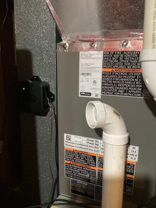 Completed planned A/C maintenance on Lennox ML13KC1-030-230A01 condensing unit charged with R-454B refrigerant. Inspected interior furnace components, verified electrical connections, and checked condensate drainage system. Unit operating normally with proper condensation present on exterior housing, all safety labels intact, and system specifications confirmed per manufacturer requirements.
