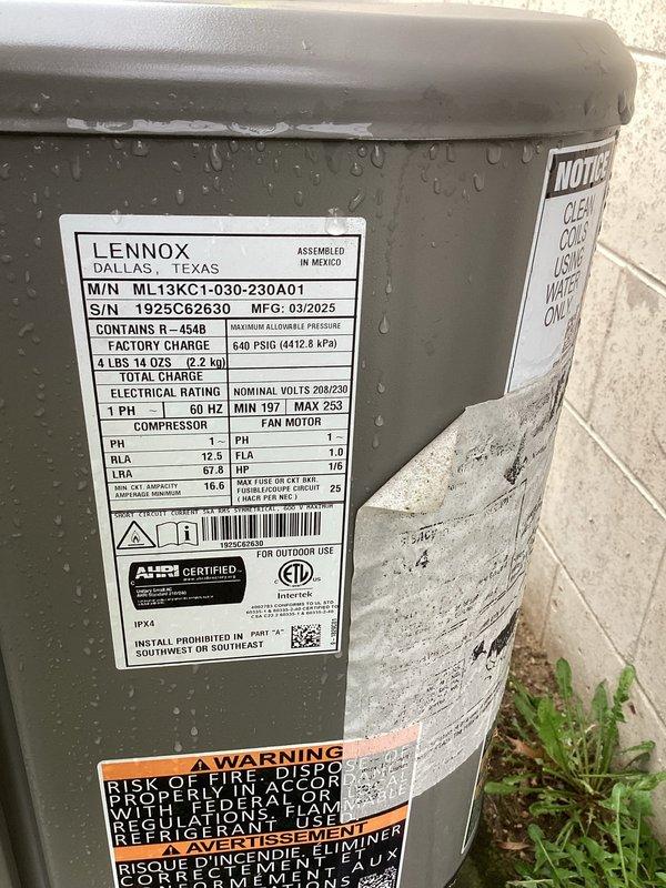 Completed planned A/C maintenance on Lennox ML13KC1-030-230A01 condensing unit charged with R-454B refrigerant. Inspected interior furnace components, verified electrical connections, and checked condensate drainage system. Unit operating normally with proper condensation present on exterior housing, all safety labels intact, and system specifications confirmed per manufacturer requirements.