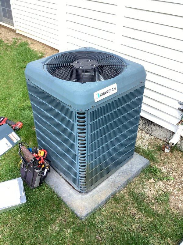 Completed planned air conditioning maintenance on Guardian outdoor condensing unit per membership agreement. Performed comprehensive system inspection including electrical compartment evaluation, verifying contactor operation, capacitor condition, and all electrical connections. Inspected wiring harnesses for proper terminations and signs of wear. Evaluated outdoor unit exterior condition, noting some weathering and minor surface rust on electrical compartment housing consistent with outdoor installation age. Verified unit is properly mounted on concrete pad with adequate clearance for airflow. All electrical components functioning within normal parameters at time of service.