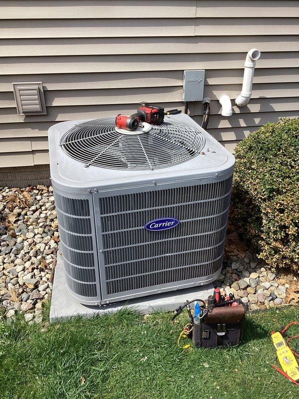 Completed comprehensive planned maintenance on Carrier air conditioning system and associated HVAC equipment. Performed standard diagnostic testing using manifold gauges to verify refrigerant pressures and system performance on outdoor condenser unit. Replaced Aprilaire #35 humidifier pad as part of Diamond membership maintenance package, ensuring optimal humidity control for the heating season.