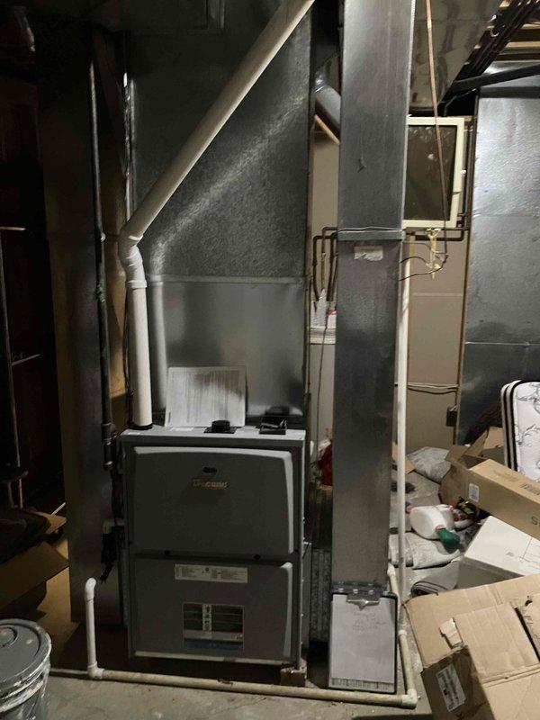 Conducted comprehensive HVAC replacement estimate for aging residential heating and cooling system with non-functional air conditioning unit. Assessed existing furnace, air handler, refrigerant lines, and ductwork configuration in basement mechanical room, documenting equipment dimensions and clearances for replacement planning. Presented high-efficiency system options to homeowner interested in modern equipment with financing alternatives.