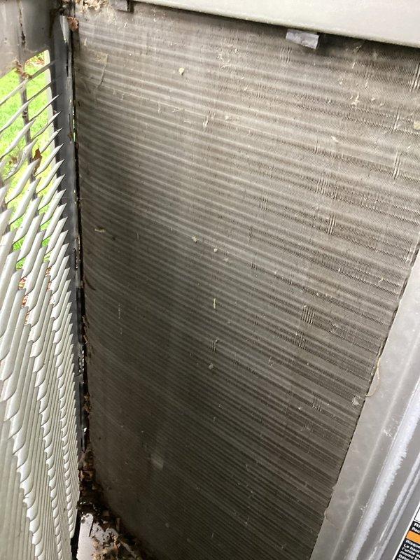 Completed planned air conditioning maintenance on Lennox outdoor condensing unit. Inspected evaporator coil and found significant dust and debris accumulation on aluminum fins; noted dirty condenser coil requiring attention. Performed standard maintenance protocol including pressure testing with manifold gauges, verified refrigerant charge levels, inspected electrical connections at disconnect box, and checked lineset insulation condition. System operational upon completion of maintenance visit.