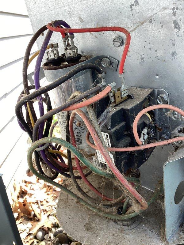 Completed scheduled air conditioning maintenance as part of membership plan. Performed comprehensive system inspection of outdoor condensing unit, including electrical disconnect box, capacitor, contactors, and fan assembly. Noted significant rust and corrosion present on electrical components and concrete pad, with weathered wiring configuration requiring monitoring for future service needs.