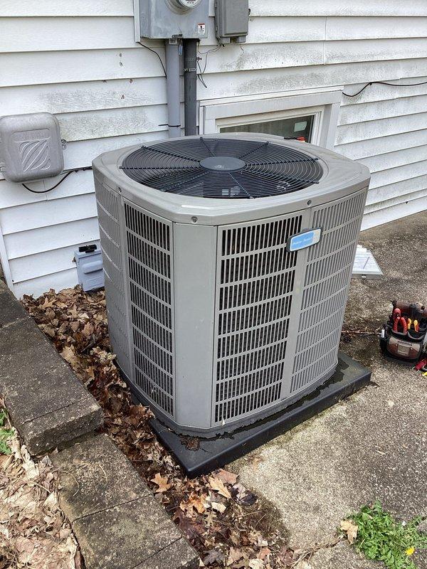 Completed scheduled air conditioning maintenance visit per HVAC membership agreement. Performed comprehensive system inspection of outdoor condensing unit, including removal of access panel to evaluate internal electrical components, capacitor condition, and wiring connections. All electrical connections found secure with no signs of damage or deterioration. Capacitor tested and operating within normal parameters. Verified proper wire routing and condition of all internal components. Inspected exterior cabinet condition, fan grille, and louvers for damage or excessive wear. Cleaned debris accumulation from around unit base and concrete pad area. Confirmed proper clearances maintained around equipment for adequate airflow. Electrical disconnect box and conduit connections inspected and found secure. System operational and functioning as designed upon completion of maintenance service.