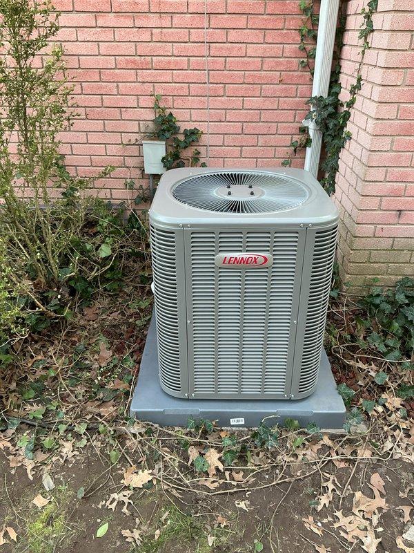 Completed installation of two separate Lennox air conditioning systems. System #1 consisted of ML13KC1-024 condenser unit paired with CK40HT-24A horizontal cased evaporator coil, with existing thermostat reused for temperature control. System #2 consisted of ML13KC1-024 condenser unit paired with CK40CT-30B cased evaporator coil, also utilizing existing thermostat. Both outdoor condensing units were positioned on concrete pads against exterior brick walls with proper clearances maintained for airflow and serviceability. All refrigerant lines were installed and systems were charged to manufacturer specifications. Electrical connections were completed to both condenser units and indoor coils, with all wiring secured and properly terminated. Systems were tested for proper operation including compressor function, airflow, and temperature differential across coils. Both units are operating within normal parameters and providing adequate cooling capacity.