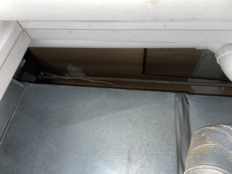 Responded to rental property for reported water leak with unknown location. Upon arrival, accessed property using lockbox and met with customer on-site. Water supply had already been shut off prior to arrival. Conducted thorough inspection of plumbing system and surrounding areas to locate source of reported running water sound. Inspected HVAC system installation in covered exterior area, examining air handler unit, ductwork connections, and surrounding infrastructure for signs of water intrusion or condensate line issues. Investigated ceiling cavity and crawl space areas where flexible metallic ducting and structural components were visible, checking for evidence of active leaks, water staining, or moisture accumulation. No standing water was present at time of inspection. Documented findings with photographic evidence of HVAC equipment, ductwork routing, and ceiling access points for future reference and customer records.