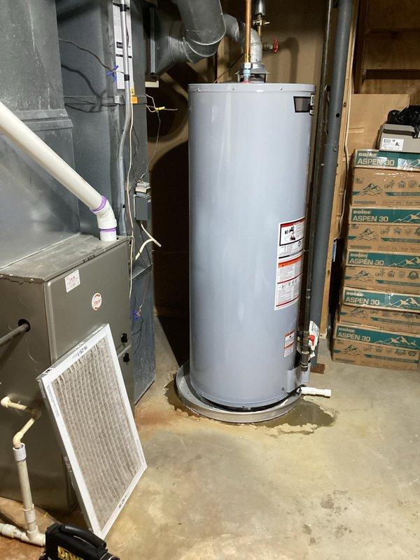 Completed scheduled HVAC membership air conditioning maintenance service during morning arrival window. Performed comprehensive system inspection of residential cooling equipment, including visual assessment of furnace unit with white air filter, ductwork connections, and associated mechanical components in basement utility area. Documented equipment condition and surrounding mechanical room environment, noting water heater, PVC drainage piping, and HVAC supply materials present in work area.