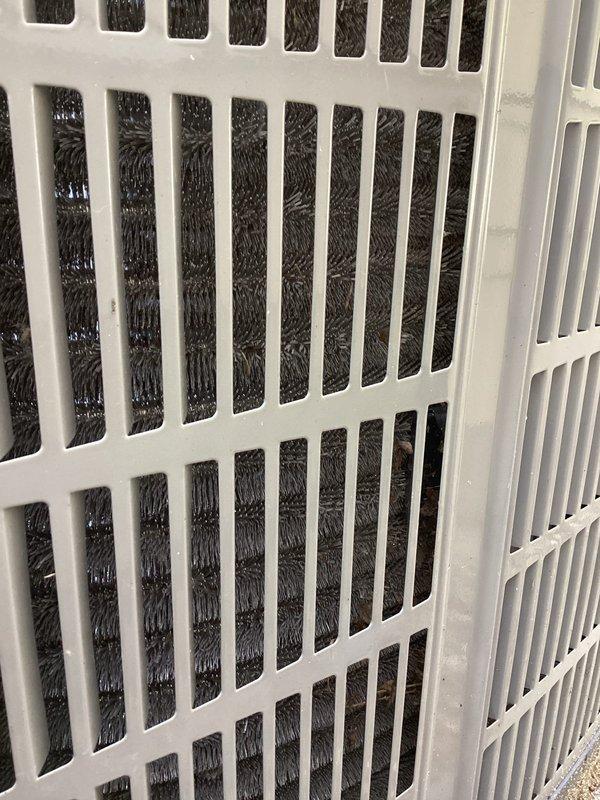 Completed planned air conditioning maintenance per membership agreement. Serviced outdoor condensing unit and replaced 20x25x1 air filter. Outdoor unit exhibited significant mold and algae accumulation on manufacturer's data plate and housing surfaces, which was noted for future cleaning consideration. Indoor air filter showed moderate dust loading and was replaced with new filter to maintain proper airflow and system efficiency.