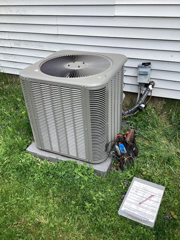 Completed planned HVAC maintenance visit for new enrollment on residential outdoor air conditioning system. Performed comprehensive inspection of condenser unit, including visual assessment of refrigerant lines showing normal oxidation on copper fittings, verified electrical disconnect box condition, documented capacitor installation and wiring configuration, and captured equipment specifications from manufacturer labels for service records.