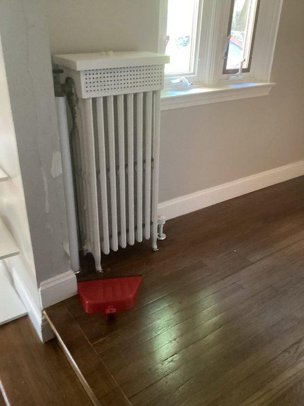 Conducted comprehensive home assessment for complete HVAC system conversion from existing boiler with column radiator heating to forced air furnace with central air conditioning. Evaluated current boiler system configuration, examined radiator placement throughout living spaces, and assessed basement utility area for new equipment installation. Documented existing infrastructure including insulated piping, exhaust venting, and electrical connections to develop conversion specifications. Presented homeowner with equipment options and system design recommendations for transitioning to ducted forced air distribution with cooling capability.