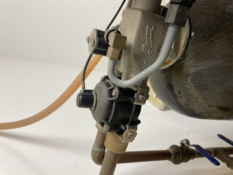 Responded to emergency call for burst pipe in utility/electric room where water damage was actively occurring. Upon arrival, confirmed main water supply had been shut off by water mitigation company to prevent further flooding. Inspected water heater plumbing connections and identified failed pressure relief valve assembly with compromised discharge piping as source of leak. Assessed copper supply lines, expansion tank mounting, and associated valve components for additional damage. Documented equipment condition and extent of water intrusion in mechanical room affecting electrical infrastructure area.