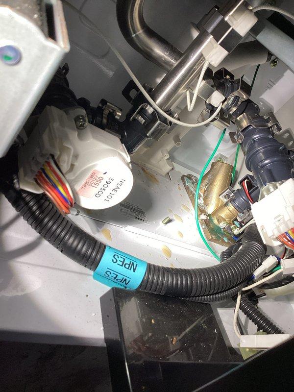 Responded to service call for tankless water heater with no hot water condition. Upon arrival, inspected Navien condensing tankless unit approximately 10 years old. Performed diagnostic evaluation of internal components including heat exchanger, gas valve assembly, and control board. Examined all water connections, gas lines, and electrical wiring for proper operation. Verified condensate drainage system and checked for any blockages or restrictions. Inspected circulation pump, flow sensor, and ignition system components. Documented equipment condition with photographs showing heat exchanger assembly, internal mechanical components, and control panel display. Unit assessed and findings provided to customer for next steps.