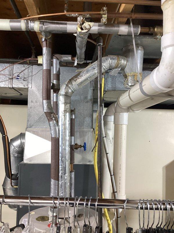 Completed planned air conditioning maintenance as part of HVAC membership service. Performed comprehensive inspection and maintenance on outdoor condenser unit and indoor air handler system. Checked refrigerant levels, electrical connections, and capacitor operation. Cleaned condenser coils and verified proper airflow through unit. Inspected all ductwork connections and insulation integrity in mechanical room. Tested system operation and confirmed proper cooling performance. Customer requested separate estimate for water heater repair or replacement, which will be provided under separate work order. System operating within normal parameters upon completion of maintenance visit.