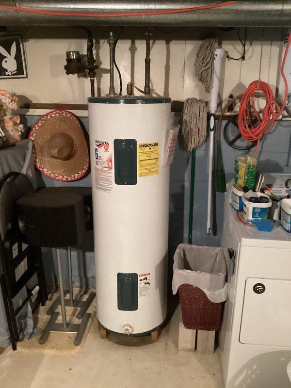 Conducted on-site assessment and provided replacement estimate for 16-year-old 50-gallon residential water heater in owner-occupied single-family home. Unit showed age-related wear consistent with expected service life, with visual documentation captured of existing installation including connecting pipes, venting, and surrounding utility space configuration. Customer coordinated scheduling preferences for future service notification to ensure household availability during installation timeframe.