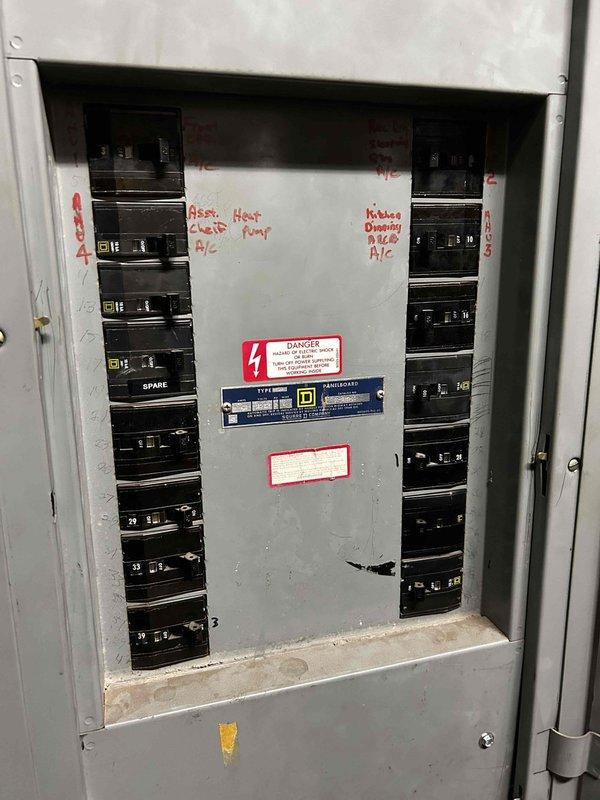 Conducted on-site assessment at fire department facility to provide estimate for mini-split system installation in workout room. Evaluated existing electrical infrastructure, including main distribution panel with adequate breaker capacity and external disconnect switch with automatic start/stop capabilities. Documented electrical service specifications and determined feasibility for ductless mini-split integration to support climate control requirements in the designated exercise area.
