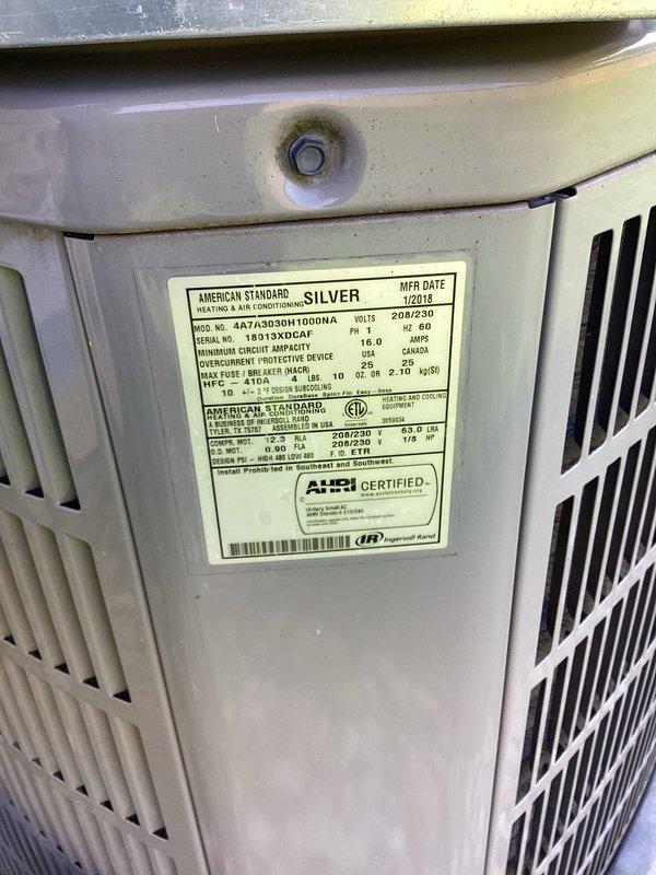 Completed scheduled air conditioning maintenance on American Standard residential condenser unit, model 4A7A3030H1000NA. Performed comprehensive system inspection including visual examination of all electrical components, wiring connections, and capacitor condition. Verified proper compressor operation and assessed overall unit functionality. Documented equipment condition through photographic records showing interior components, electrical connections, and manufacturer specifications. Unit operational and ready for cooling season.