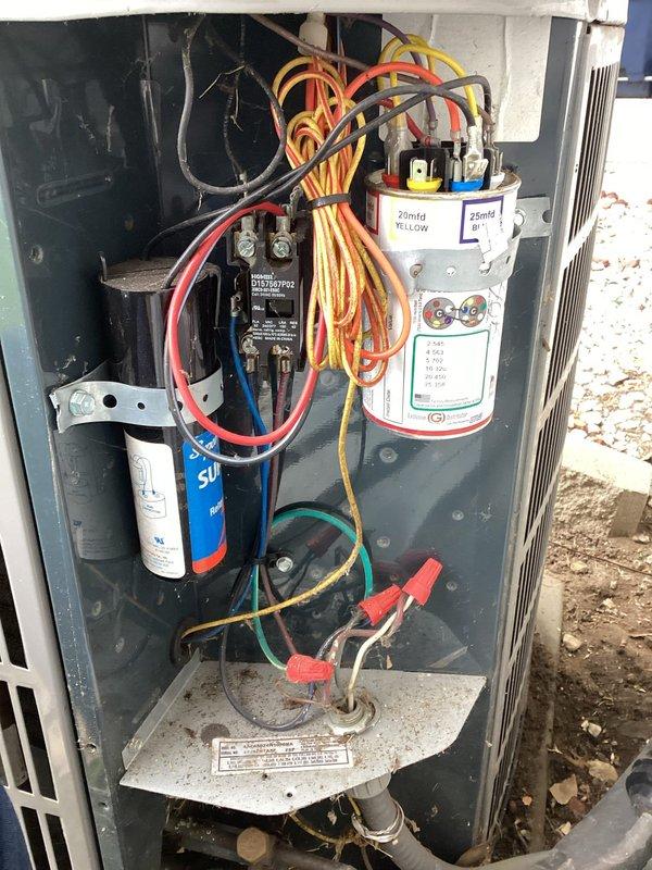 Completed planned air conditioning maintenance on outdoor condensing unit. Performed system inspection, replaced Media 410 air filter and HUM 35 humidifier component, tested electrical components including dual capacitors and contactor, and verified proper system operation within manufacturer specifications.