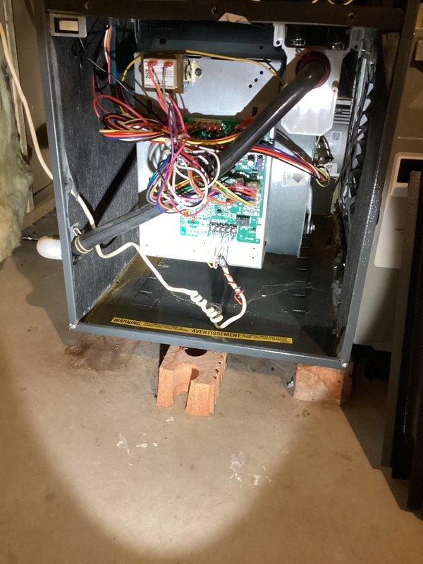 Responded to no-cool call at commercial church facility where cleaning company reported leaking at indoor coil. Upon arrival, accessed air handler unit and confirmed system operating but not cooling correctly. Inspected internal components including blower assembly, control boards, and evaporator coil section. Documented existing conditions showing moisture concerns at coil area with photographic evidence of unit interior, wiring configurations, and component layout for further diagnostic evaluation and repair recommendations.