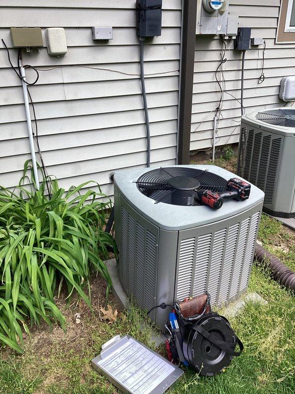 Completed comprehensive air conditioning maintenance and performance evaluation on outdoor condensing unit. Performed electrical inspection checking for loose connections, verified proper energy draw on motors, tested refrigerant charge levels, and cleaned exterior components showing weathering and biological growth. Conducted thermostat calibration, assessed overall system comfort performance, and confirmed unit operational status as part of recurring membership maintenance program.