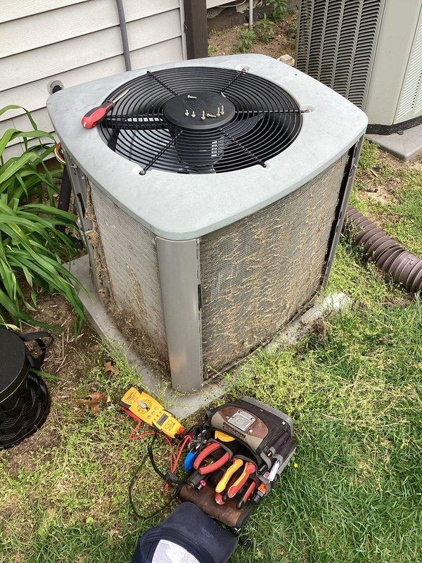 Completed comprehensive air conditioning maintenance and performance evaluation on outdoor condensing unit. Performed electrical inspection checking for loose connections, verified proper energy draw on motors, tested refrigerant charge levels, and cleaned exterior components showing weathering and biological growth. Conducted thermostat calibration, assessed overall system comfort performance, and confirmed unit operational status as part of recurring membership maintenance program.