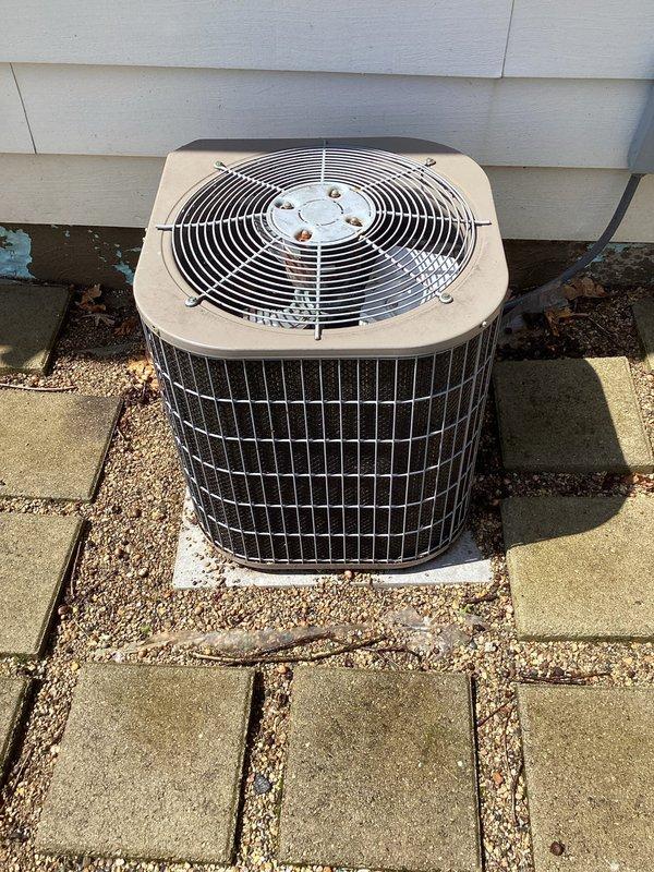 Completed scheduled air conditioning maintenance per membership agreement. Performed comprehensive system inspection of outdoor condenser unit, replaced two 16x20x1 air filters, checked electrical connections and disconnect box, verified proper airflow through condenser coils and grille assembly, and confirmed unit operation on concrete pad with adequate clearances from surrounding landscaping and structure.