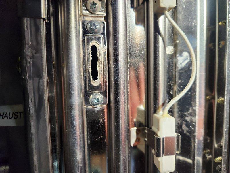 Responded to service call for 6-8 year old tankless water heater with reported burning metal odor and visible burn damage on unit panel. Upon arrival, unit was unplugged by customer as a safety precaution. Conducted thorough visual inspection of exterior panel and internal components. Removed front access panel to examine internal wiring, electrical connections, heat exchanger, and control board assembly. Documented burn damage on exterior panel surface and inspected associated electrical connections and wiring harness for signs of overheating, arcing, or component failure. Photographed damaged areas and internal components for diagnostic documentation. Verified no active water leaks present in system. Assessed condition of copper heat exchanger coils, compressor motor connections, digital control panel, and all visible wiring throughout unit compartment. Inspection revealed signs of electrical failure requiring further diagnostic evaluation and component replacement to restore safe op