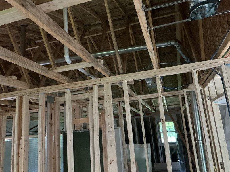 Installed dryer vent system in new construction property, routing ductwork through ceiling joists and wall framing to exterior termination point. Coordinated with restoration contractor upon completion to schedule required building inspections.