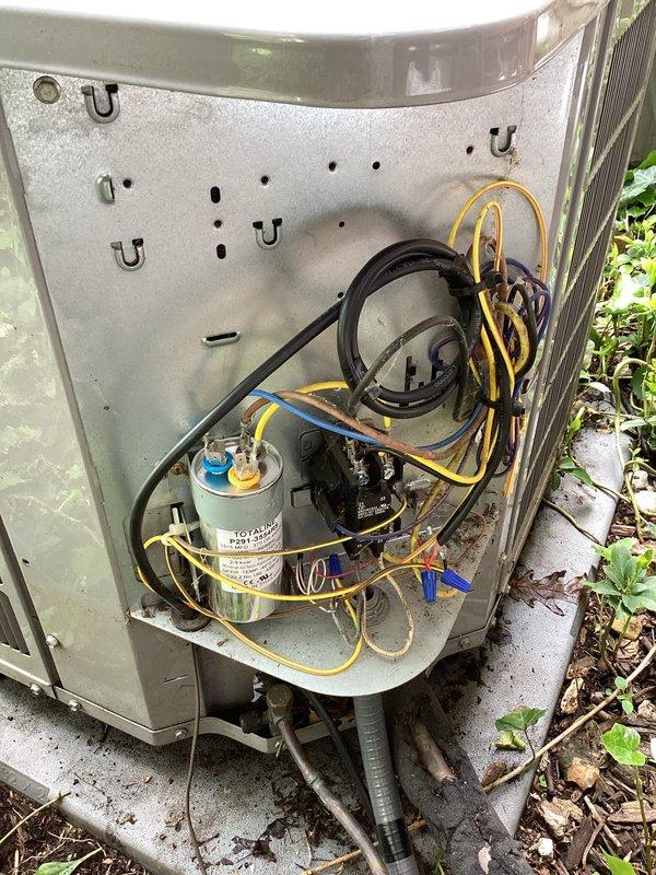 Chemically cleaned two A/C condenser coils to remove accumulated dirt and debris, restoring proper airflow and heat transfer efficiency. Removed vines and vegetation that had grown into and around the condenser coils, which were obstructing airflow and potentially damaging the fins. Inspected internal electrical components, capacitor, and wiring connections to ensure proper system operation following the cleaning procedure.