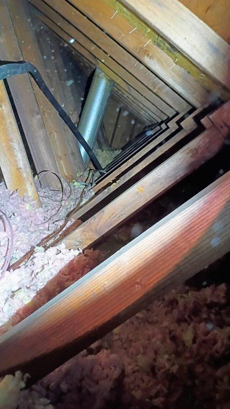 Responded to install callback for gas furnace not operating with thermostat error code HE223. Upon arrival, home temperature was 65°F with thermostat set to 69°F. Inspected attic installation access point and rooftop termination components. Verified all ductwork connections, assessed ventilation system integrity, and performed diagnostic troubleshooting to resolve thermostat communication error and restore heating operation.