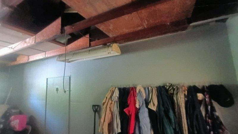 Conducted on-site assessment for dryer vent ductwork replacement in residential laundry room. Evaluated existing metal ductwork configuration in basement utility area and laundry space, documented current installation routing from dryer unit through ceiling joists to exterior termination point, and provided detailed estimate for complete dryer exhaust system replacement with proper materials and code-compliant installation.