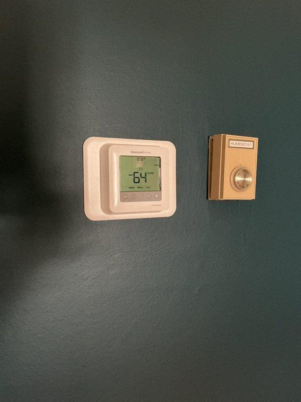Completed full HVAC system installation including Lennox EL297UH090XV48C high-efficiency furnace, EL18KCV-048 condensing unit, CK40CT-49C cased coil, T6 digital thermostat, 1610 media filter elbow, and 600M whole-home humidifier. All equipment installed, properly vented with PVC piping, connected to existing ductwork, and mounted in designated utility space with appropriate clearances. System tested and operational with thermostat and humidistat programmed and functioning correctly.