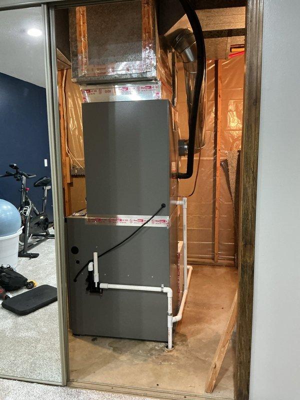 Completed full HVAC system installation including Lennox EL297UH090XV48C high-efficiency furnace, EL18KCV-048 condensing unit, CK40CT-49C cased coil, T6 digital thermostat, 1610 media filter elbow, and 600M whole-home humidifier. All equipment installed, properly vented with PVC piping, connected to existing ductwork, and mounted in designated utility space with appropriate clearances. System tested and operational with thermostat and humidistat programmed and functioning correctly.