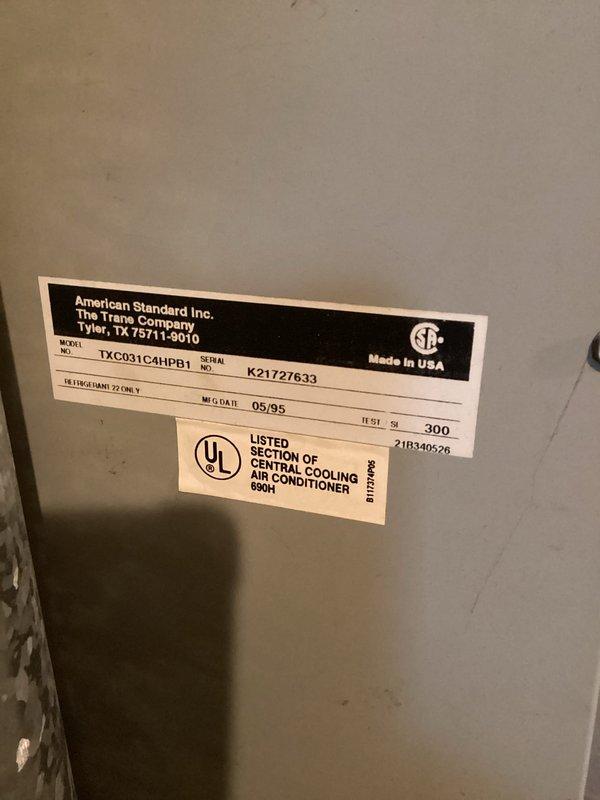 Responded to no cooling complaint on American Standard air conditioning system with reported warm air discharge, reduced airflow, and ice buildup on outdoor unit. Upon arrival, confirmed evaporator coil freeze-up condition. System was turned off to allow proper defrost of ice accumulation. Documented equipment specifications showing TXC031CA1PB1 model condenser manufactured in 1995, indicating unit is well beyond typical service life expectancy. Will require follow-up diagnostic evaluation after complete thaw cycle to determine root cause of freezing condition, which may include restricted airflow, low refrigerant charge, failed blower motor, or dirty evaporator coil.