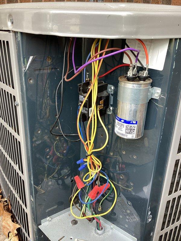 Completed planned air conditioning maintenance on residential outdoor condensing unit. Performed visual inspection of unit exterior, removed top access panel to inspect internal electrical components including capacitor, contactor, and wiring connections, and verified all components were functioning properly with no immediate repairs needed.