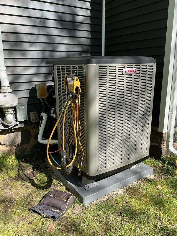 Completed full dual fuel HVAC system installation including Lennox EL297UH070XV36B high-efficiency furnace, EL21KLV-036 heat pump unit, and CK40CT-36B cased evaporator coil. Installed TH6320WF2003 Wi-Fi thermostat programmed for dual fuel operation to optimize heating efficiency between electric and gas sources. Mounted heat pump condenser on 40x40x3 composite pad with proper leveling and clearances. Added 1610 media air cleaner to ductwork for enhanced indoor air quality. Ran and insulated refrigerant lines between indoor and outdoor units, evacuated system, and charged to manufacturer specifications. Installed PVC condensate drain lines and venting per code requirements. Verified all electrical connections, tested system operation in both heating and cooling modes, confirmed proper airflow across coil, and ensured seamless switchover between heat pump and furnace stages based on outdoor temperature thresholds.