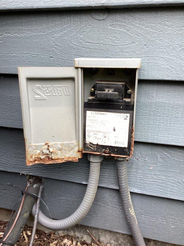 Completed scheduled air conditioning maintenance as part of membership plan service. Performed standard cooling system inspection and maintenance procedures on HVAC equipment. Documented existing rust and corrosion present on exterior electrical disconnect box, with significant deterioration noted at base of unit and conduit connections requiring future attention.