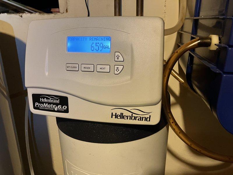 Completed scheduled HVAC cooling system maintenance as part of membership plan, including filter inspection and system evaluation. Documentation captured water treatment system and plumbing infrastructure present at service location for reference purposes.