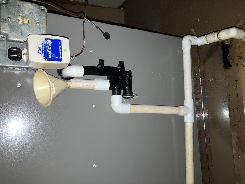 Completed scheduled HVAC cooling system maintenance as part of membership plan, including filter inspection and system evaluation. Documentation captured water treatment system and plumbing infrastructure present at service location for reference purposes.