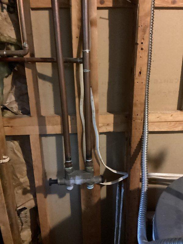Removed existing garbage disposal unit and installed new replacement disposal. Disconnected electrical connections and plumbing drain lines from old unit, removed mounting hardware from sink flange, and extracted disposal. Installed new garbage disposal by securing mounting assembly to existing sink drain opening, connecting discharge drain line with appropriate P-trap configuration, and completing electrical wiring connections. Tested unit for proper operation, verified all connections for leaks, and ensured proper drainage flow through the system.