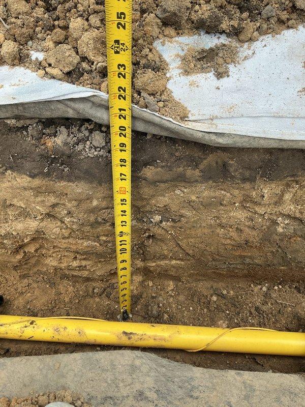 Obtained utility locate clearance and installed approximately 90 feet of 1-1/2" gas line from the meter location on the north end of the structure to the equipment pad in the backyard. Excavated trench to proper depth per code requirements, secured gas line with appropriate brackets, and backfilled trench upon completion of installation.
