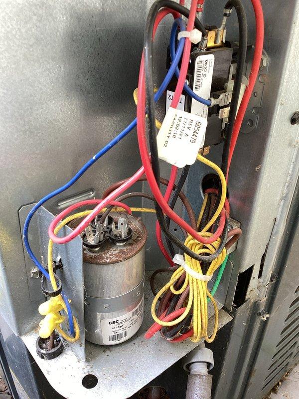 # HVAC Maintenance Completed

Performed scheduled preventive maintenance on church air conditioning system as part of recurring membership service. Conducted comprehensive inspection of outdoor condensing unit and electrical components. Inspected capacitor, contactor, and associated wiring within control panel, verifying all electrical connections were secure and properly terminated. All color-coded wiring showed proper installation with no signs of overheating or degradation. Examined refrigerant line sets and insulation at outdoor unit, noting foam insulation and copper piping in serviceable condition. Verified condensate drain line routing and checked equipment mounting on concrete pad. System operational and ready for cooling season.